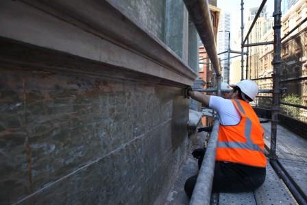 Workers hand-washing surfaces